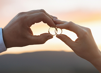 Couple embracing during engagement photoshoot