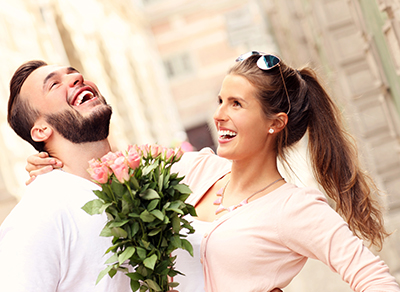 Couple laughing during engagement session