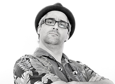 Portrait of a funny dude wearing Fedora hat