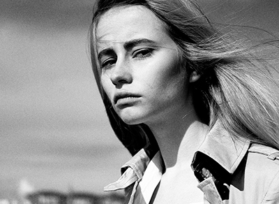 Black and white portrait with dramatic lighting