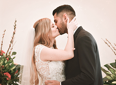 Couple embracing during sunset photoshoot
